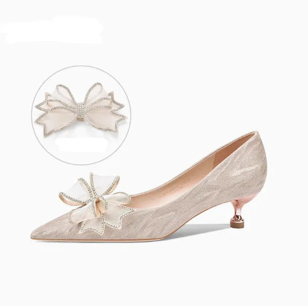 Champagne coloured women's stiletto pumps with sequin and crystal decoration on the upper