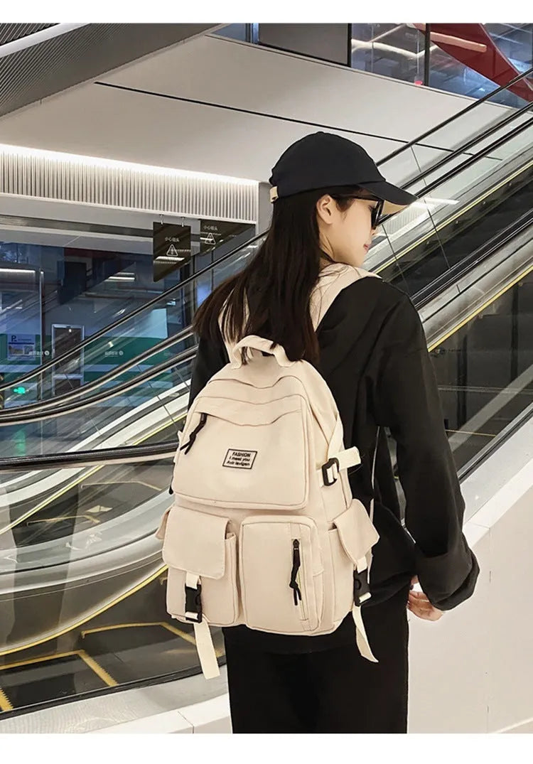 Nylon student backpack with computer compartment in black and white colour options