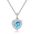 Sterling silver heart necklace with a choice of amethyst, citrine, topaz, olivine, or garnet gemstone on an adjustable chain.
