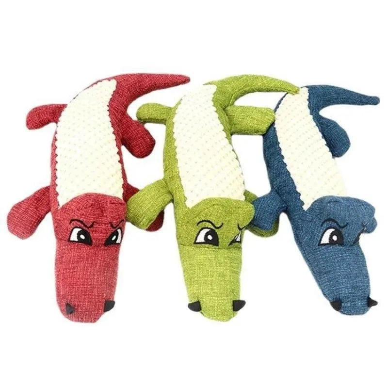 Blue, green, and red corn cob plush pet toys with textured grid pattern