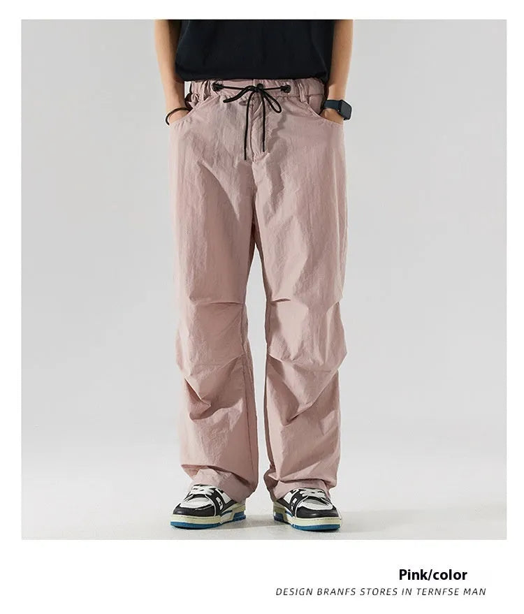 Men's straight-leg casual trousers in thin ice silk nylon fabric showing loose fit and colour options