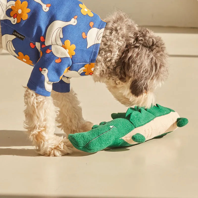 Green soft plush toy dog on white background, showing its 35 cm size.