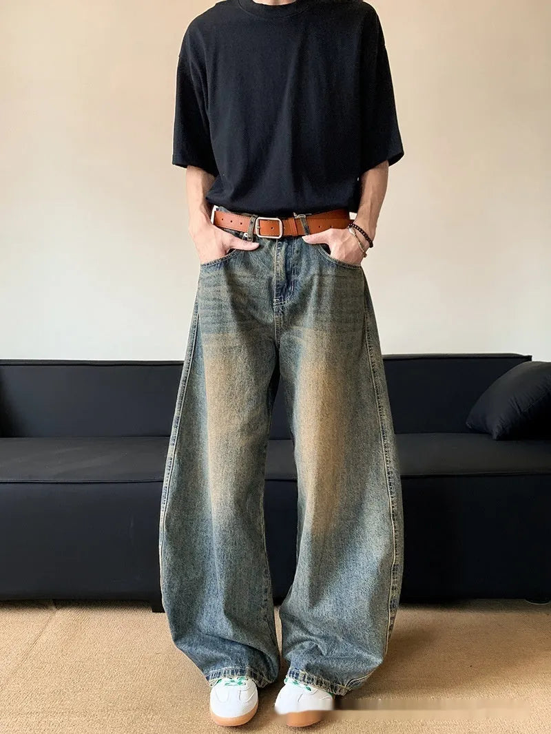 Men's retro blue distressed denim pants with wide leg cut and micro elasticity fabric
