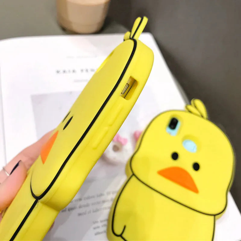 Green silicone iPhone case with cartoon animal design showing front and back views