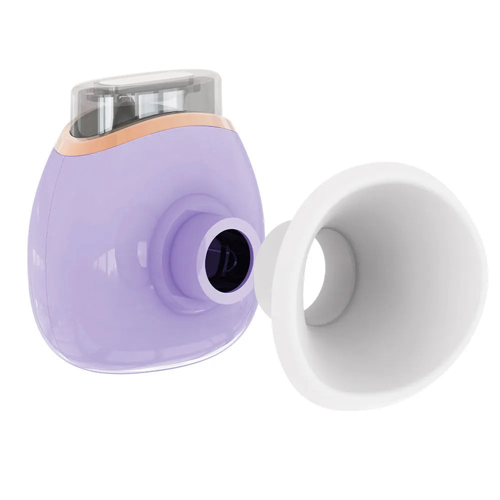White and purple portable household eye humidifier with charging cable on a table