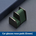 Green zinc alloy and leather car dashboard glasses clip holder with nose pad.