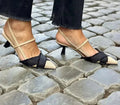 Women's pointed toe stiletto sandals with colour block design, buckle fastening, and 6-8cm heel in apricot and black
