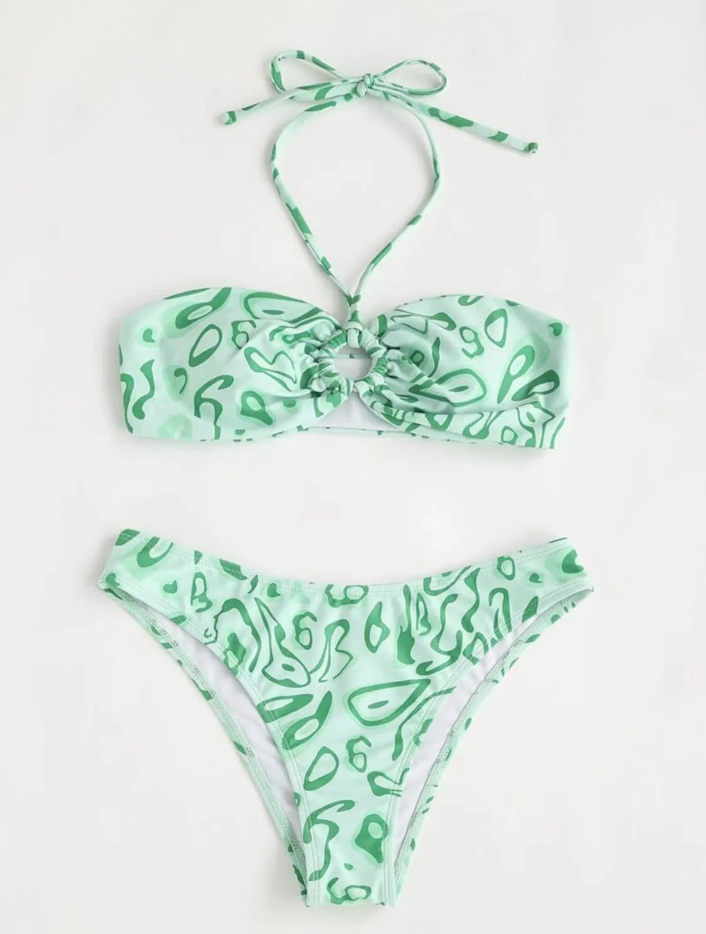 Green floral bandeau bikini swimsuit with split style bottom and backless design on mannequin