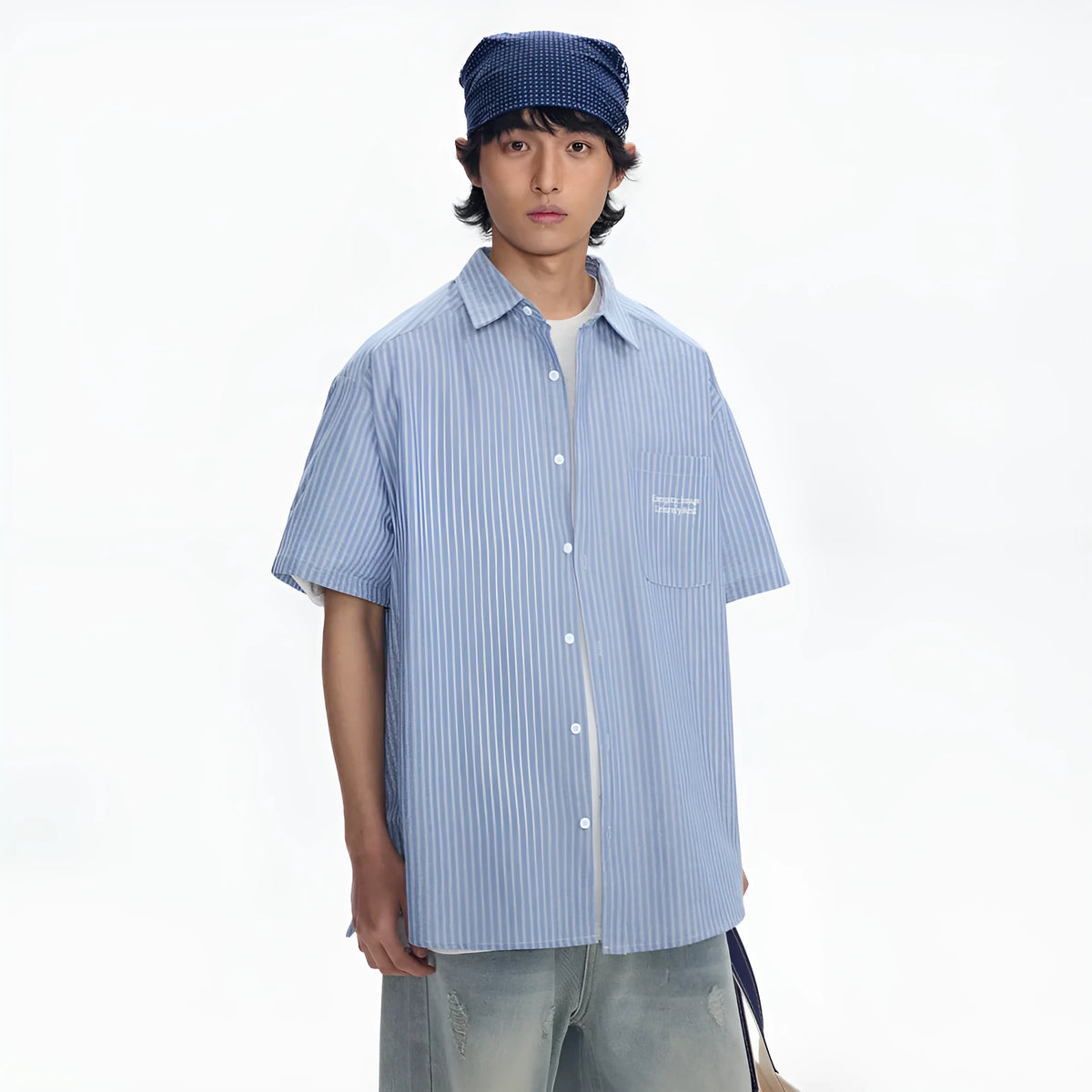 Blue striped loose short-sleeved shirt in cardigan style on a hanger