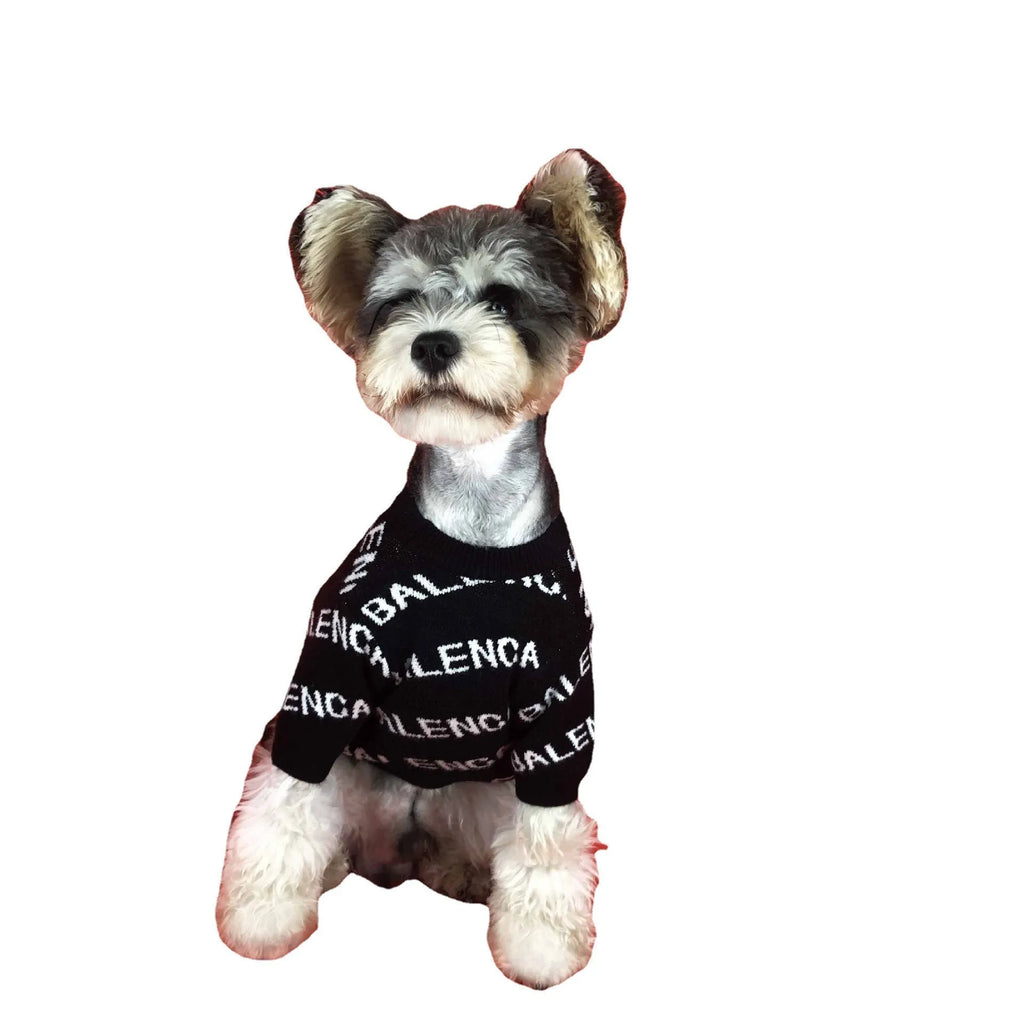 Acrylic pullover dog sweater in black or green, sizes S to 2XL, with neck, bust, and back length measurements.