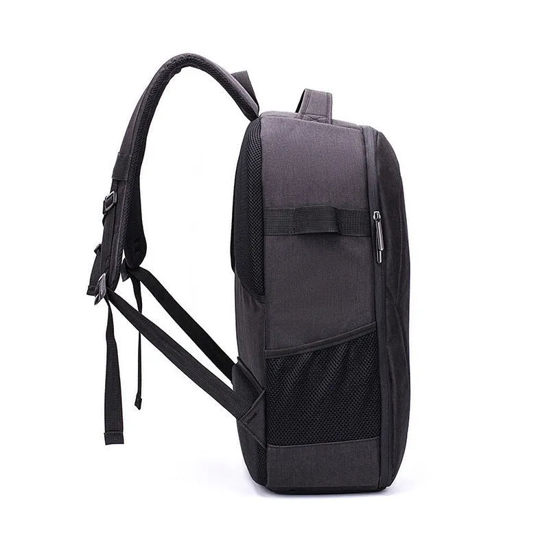 Black Oxford cloth drone backpack showing internal camera and laptop compartments.