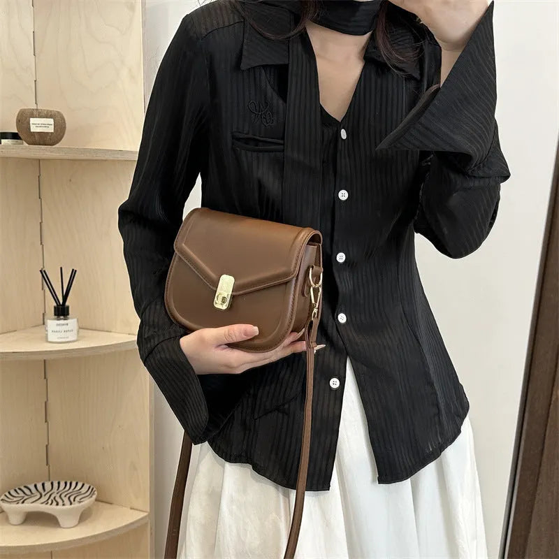 Soft PU shoulder messenger bag with clamshell opening in horizontal square shape