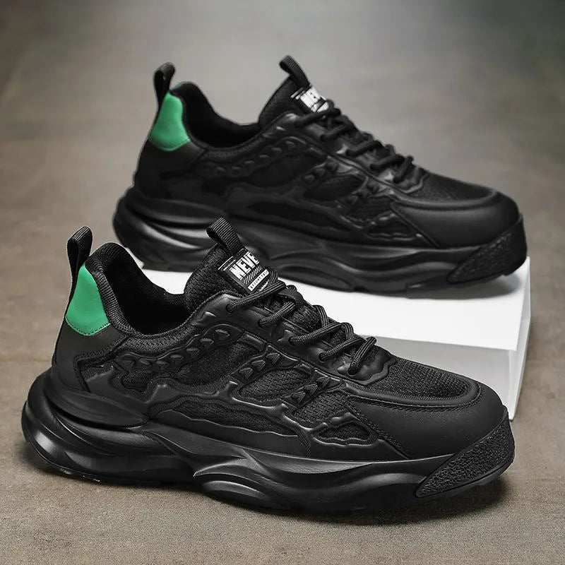 Men's solid colour breathable mesh sports shoes with round toe in white or black.