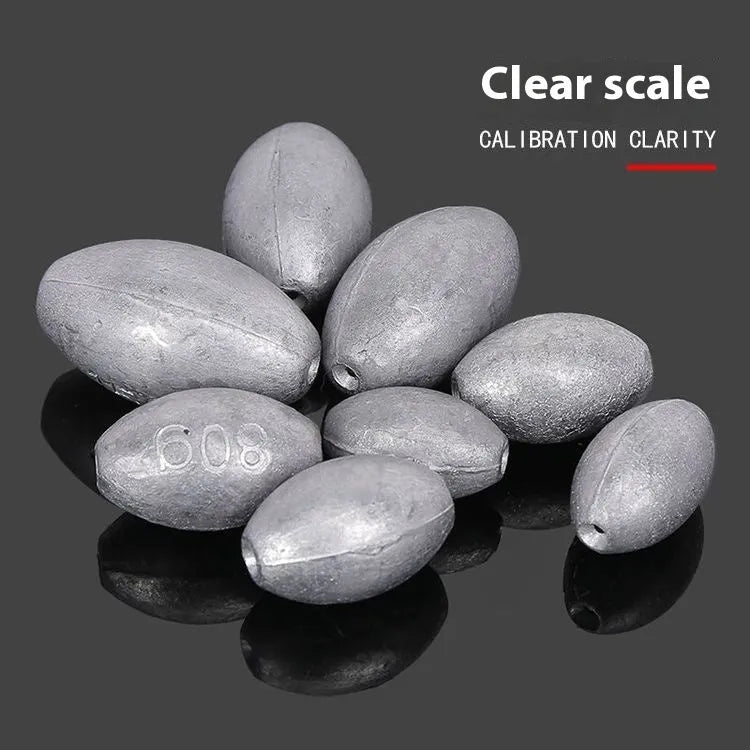 Tongxin olive-shaped lead fishing sinker with scale markings, showing rugby shape and plastic core construction.