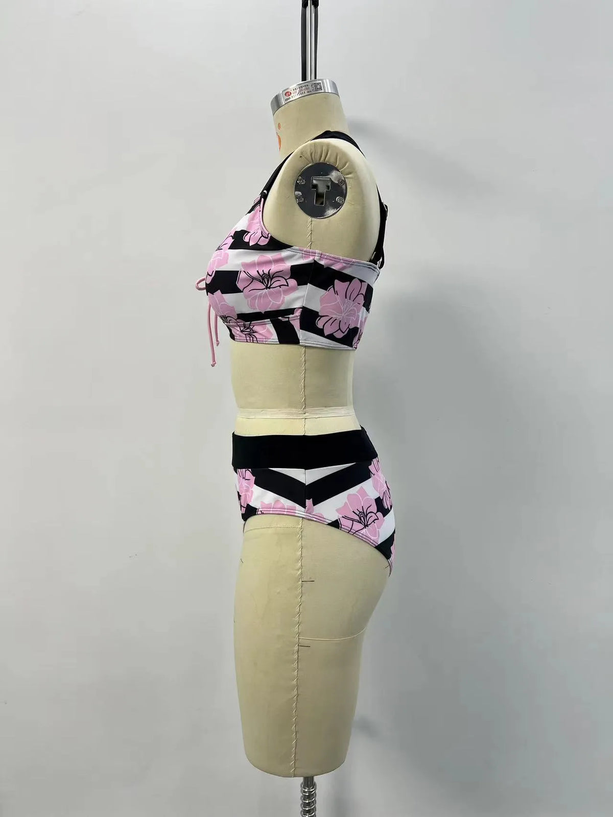 Black women's split bikini with belly coverage design for swimming