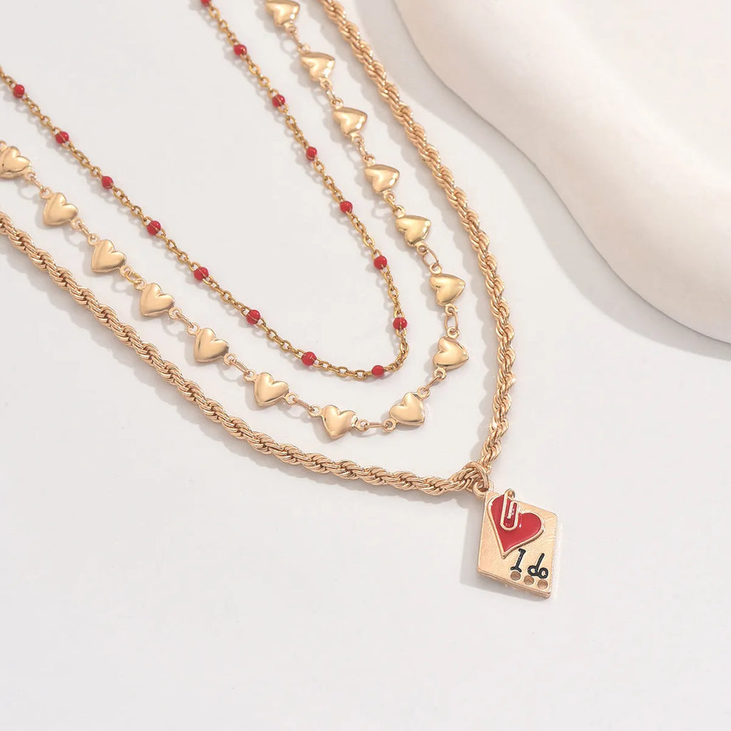 Gold-colour clavicle chain necklace with three-layer geometric heart pendant on adjustable chain