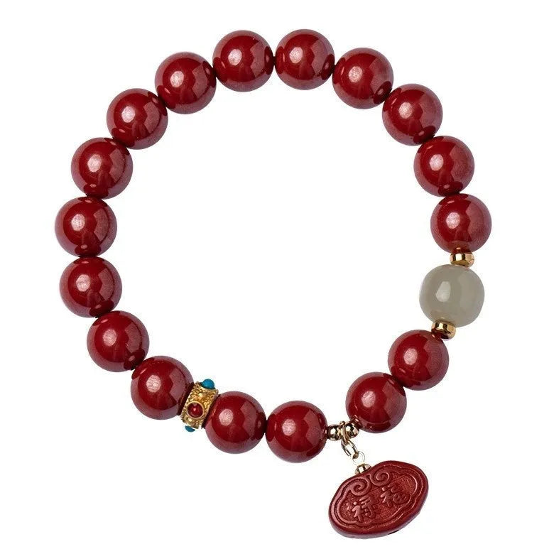 Natural cinnabar bracelet with Emperor Sandstone design in 8mm and 10mm sizes