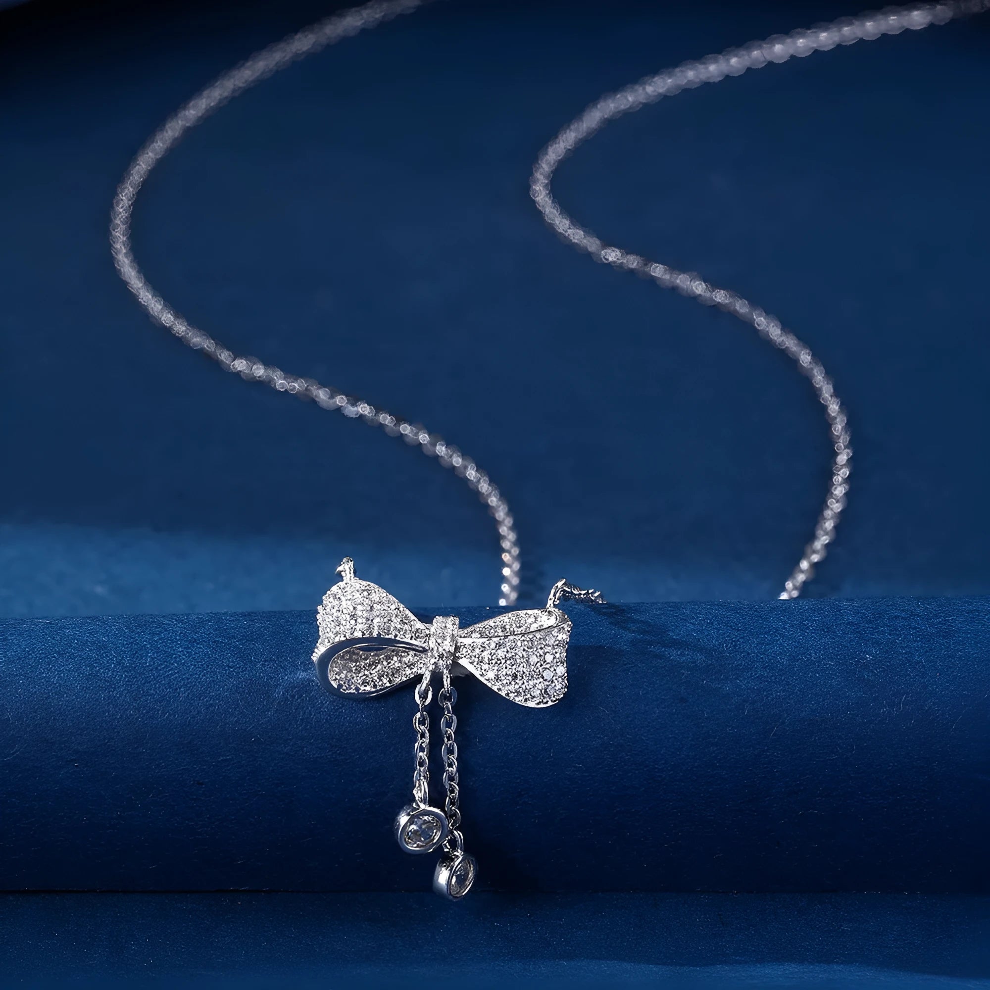 S925 sterling silver bow pendant necklace on adjustable O-ring chain, clavicle length