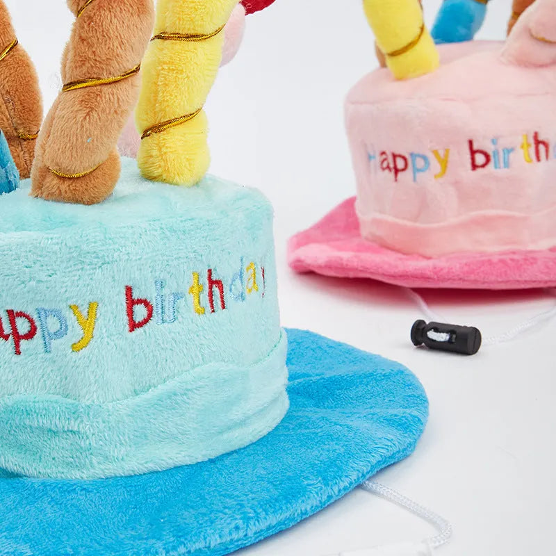 A blue or pink birthday hat for small dogs, shown with dimensions of 21cm by 15cm.