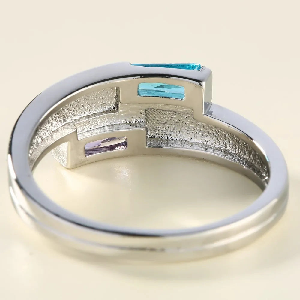 Copper ring with silver electroplating and central zircon stone, unisex design