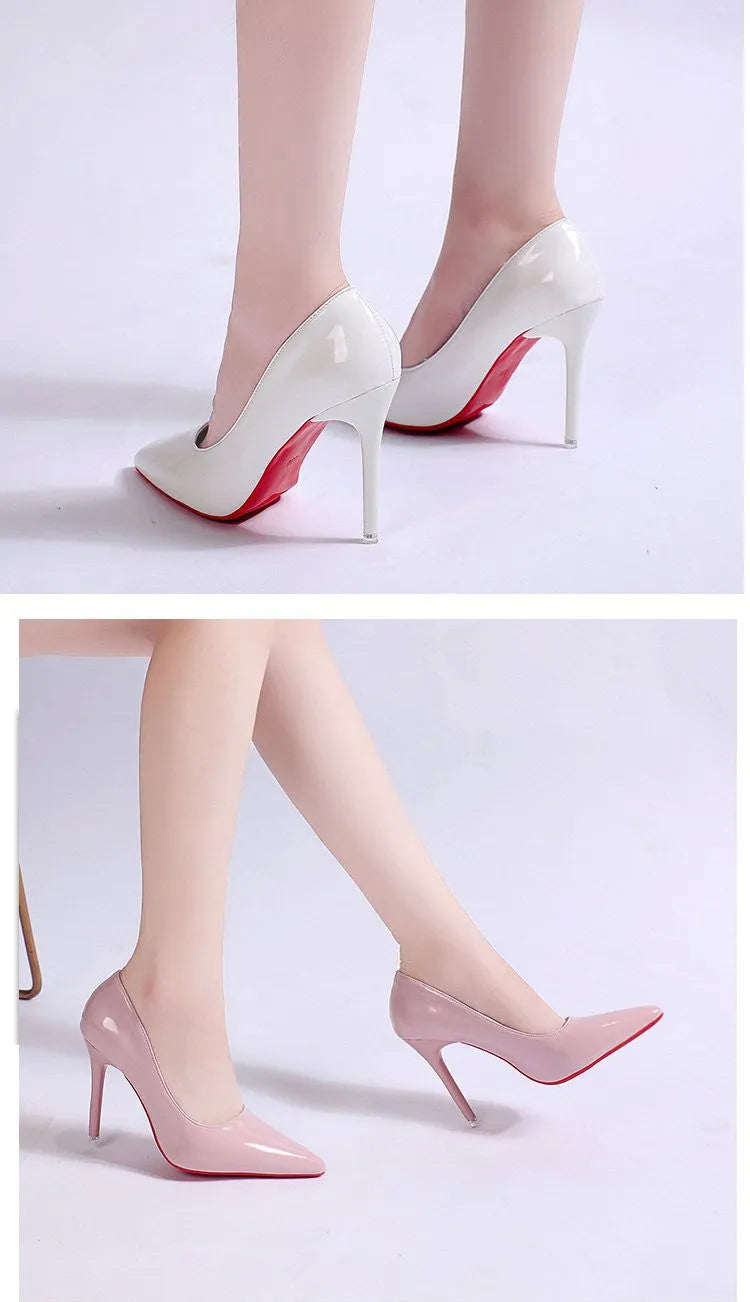 Women's black pointed toe stiletto heel pump with a low top and rubber sole.