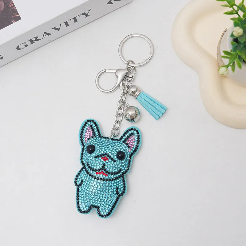 Cartoon dog design rhinestone keychain pendant on alloy base in caramel colour