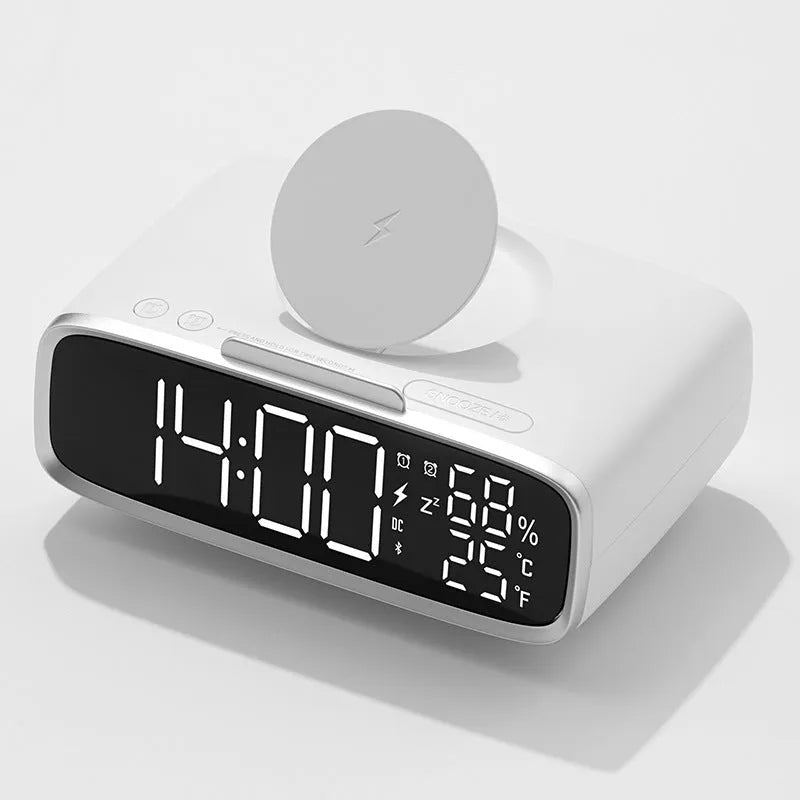 White 3-in-1 bedside unit with wireless charging pad, Bluetooth speaker, and night light.