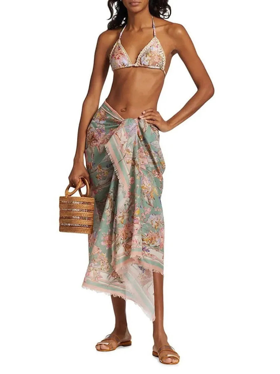 Women's creamy-white floral bikini set with matching skirt in nylon fabric