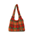 Women's plaid crossbody shoulder bag in soft plush material showing orange, purple and army green colour options