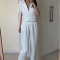 Women's loose fit casual polyester short sleeve top in white, black or yellow