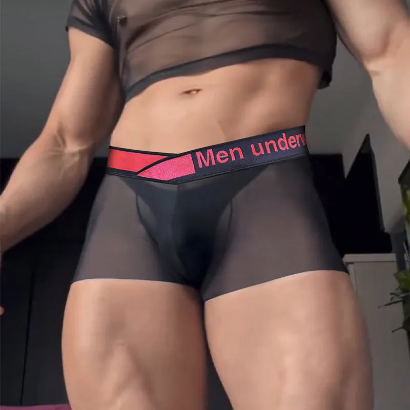 Gradient laser print men's low waist modal underwear in black on a mannequin.