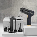Black wireless handheld vacuum cleaner with multiple nozzle attachments for car and home cleaning