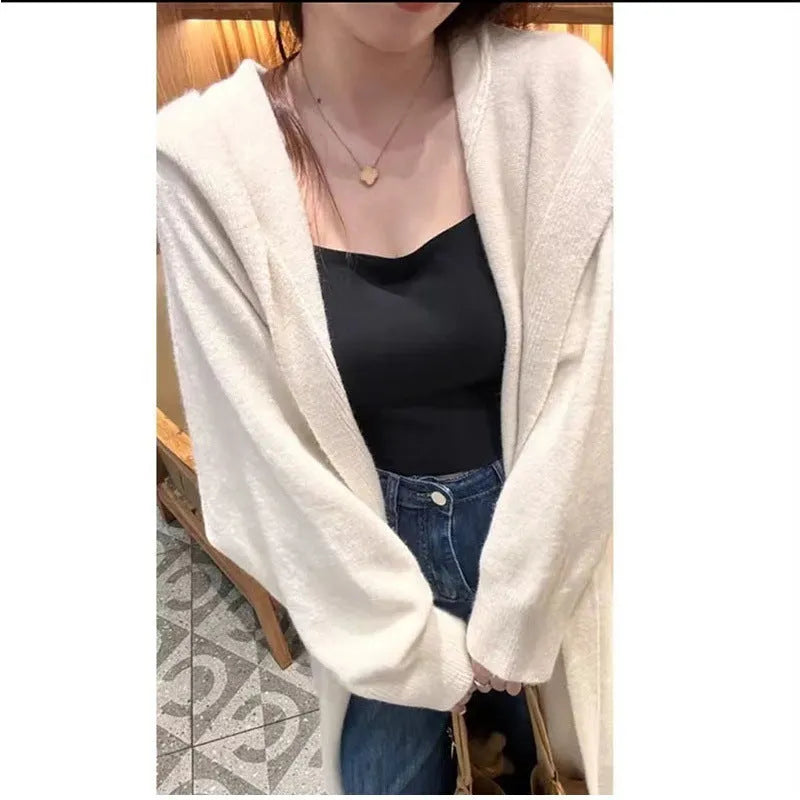 Korean style long hooded cardigan for women in oatmeal colour, showing below-the-knee length and loose fit.