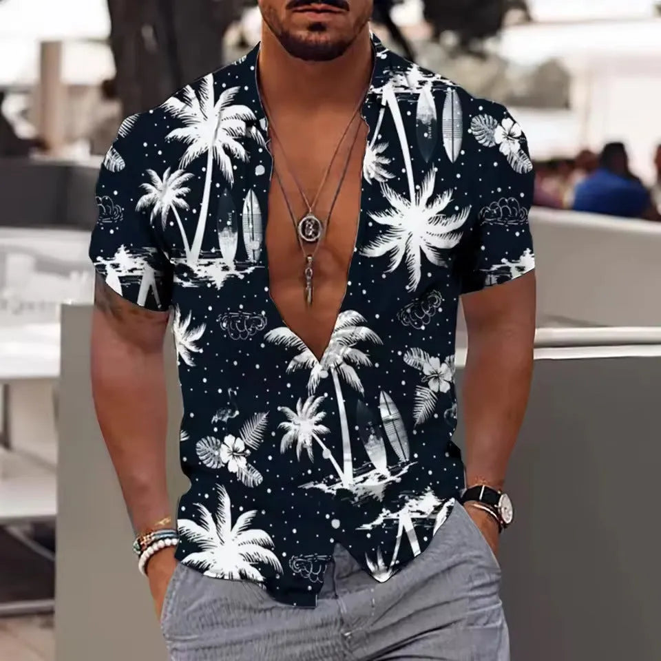 Man wearing a loose-fit short sleeve floral print shirt in a cardigan style on the beach.