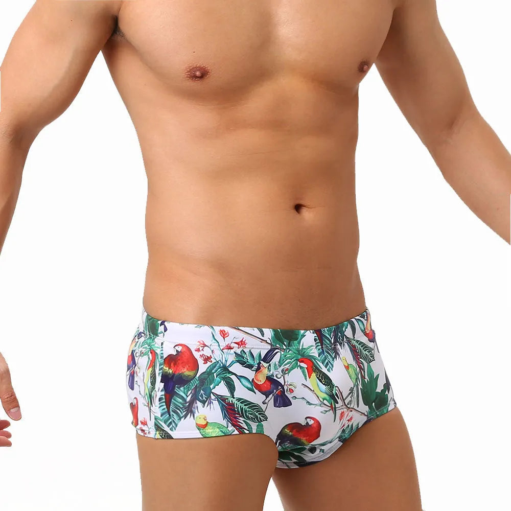 Men's swimming trunks with flower and bird print design in nylon fabric for beach and pool swimming