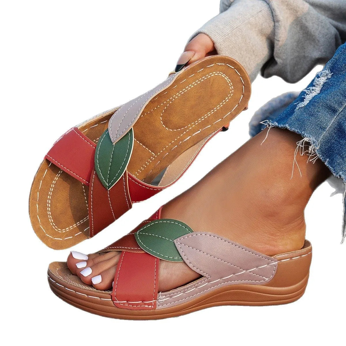 Women's black thick-soled slippers with cross-strap design and peep-toe opening