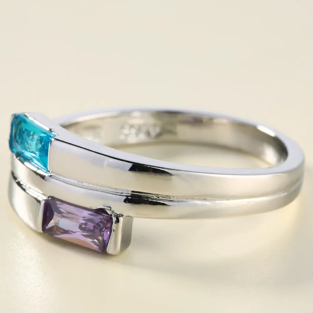 Copper ring with silver electroplating and central zircon stone, unisex design