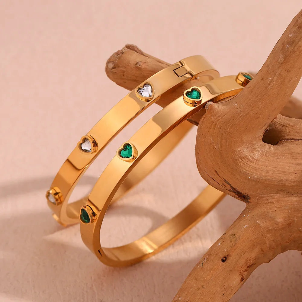 Stainless steel peach heart bracelet with micro-inlaid coloured stones in gold electroplated finish