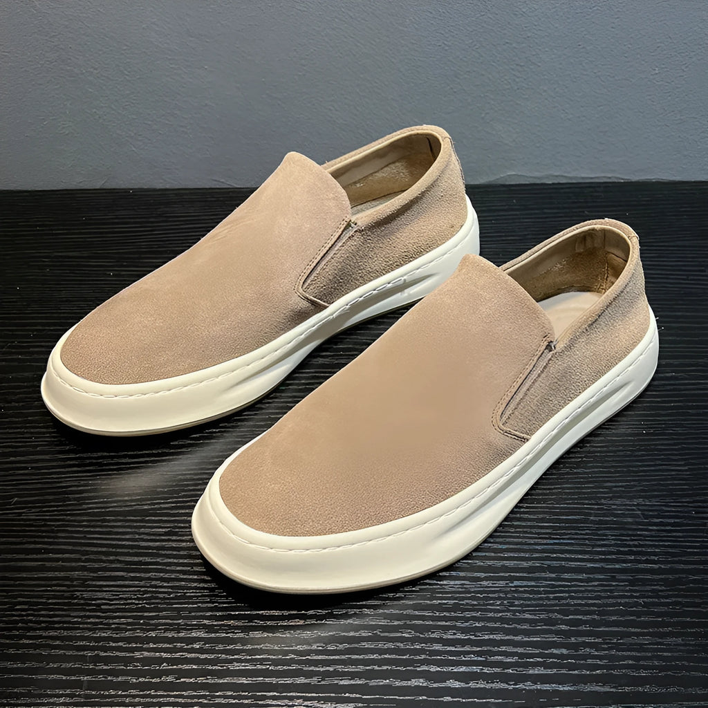 Men's grey casual lace-up shoes with round toe, stitching detail, and a rubber sole.