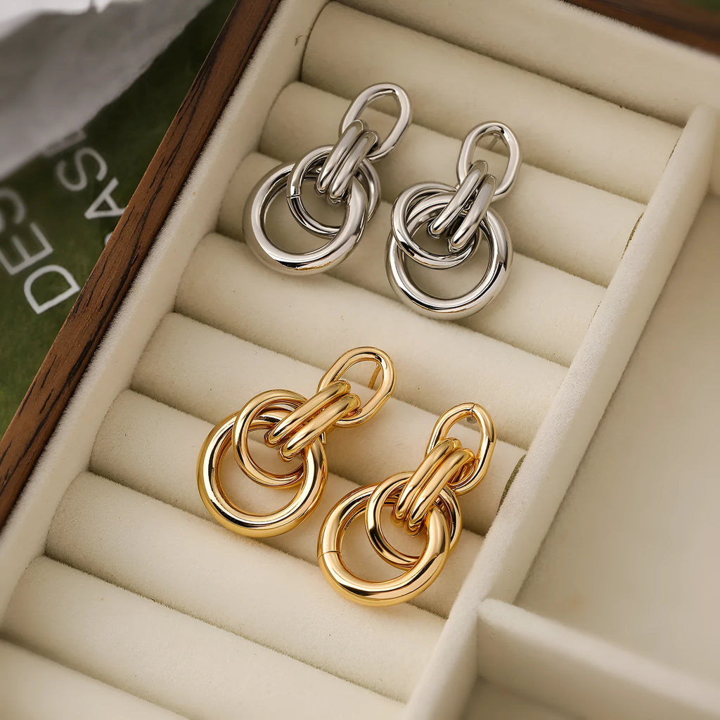 Gold-coloured geometric copper earrings with irregular shape and simple styling for women