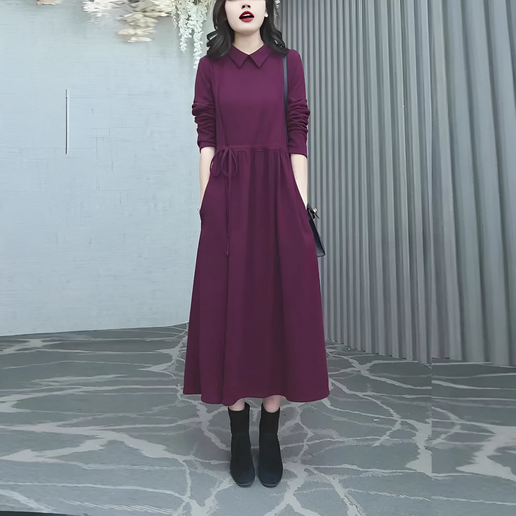 Purplish red long sleeve plus size dress for women, urban winter commute style.