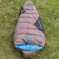 Outdoor mummy sleeping bag in army green colour with compression storage bag