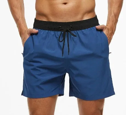 Men's blue athletic shorts with stitching waistband headband pocket and drawstring closure