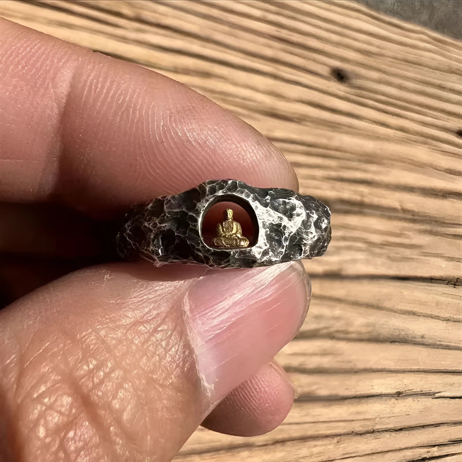 Hand-forged copper ring with textured Buddha design and rock-like surface in size UK 8