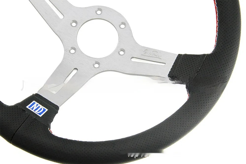 14-inch leather steering wheel with middle concave design showing hand-stitched detailing