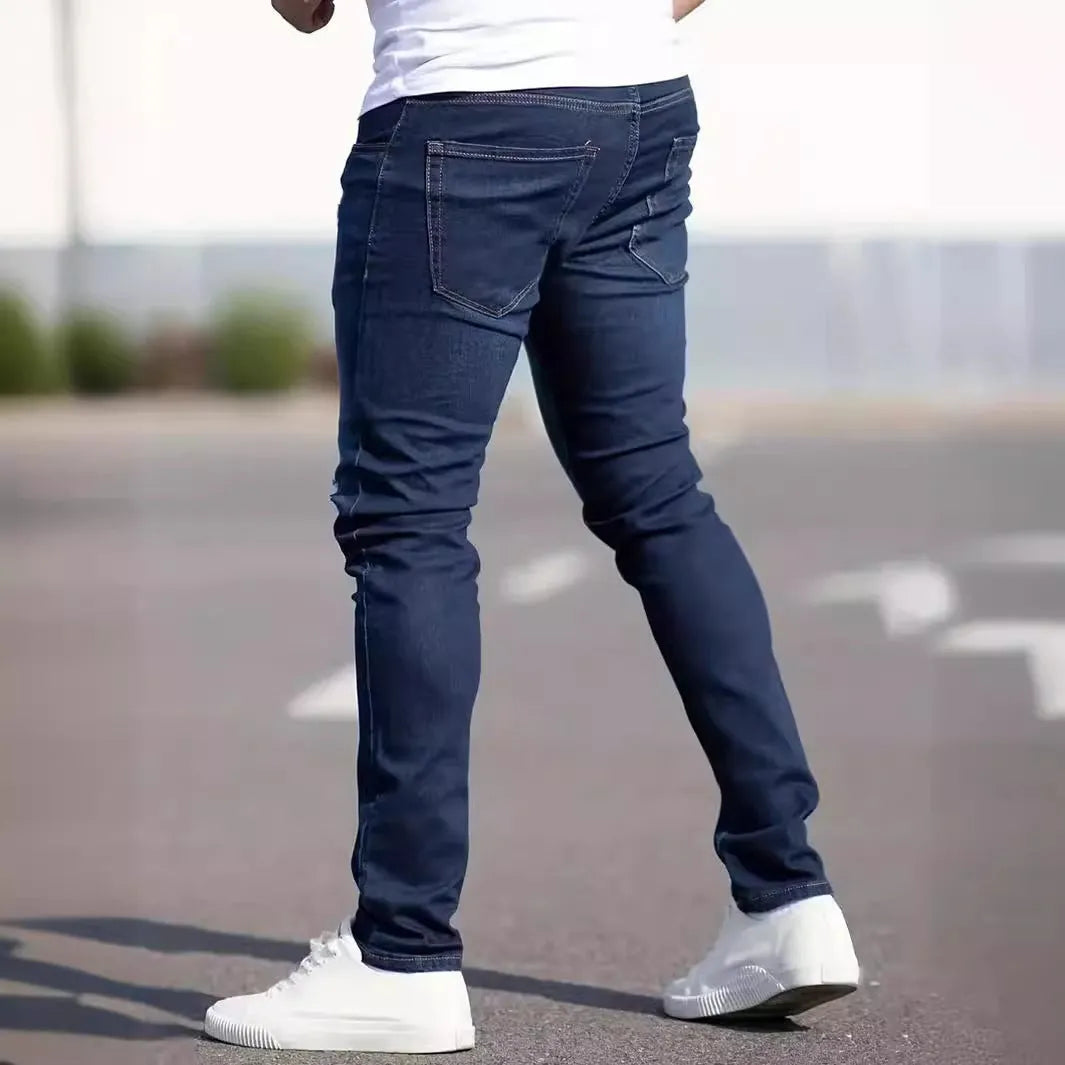 Men's dark blue slim fit casual jeans with skinny leg street fashion styling