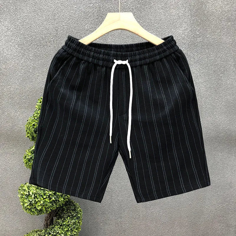 Men's black and white striped casual shorts with double-layer waistband and ankle banded styling