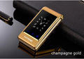 Dual screen flip phone in black showing internal touch screen and external display.