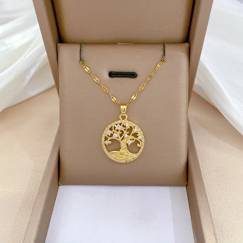 Gold-plated cross necklace with mother pearl pendant and full rhinestone detailing on adjustable stainless steel chain