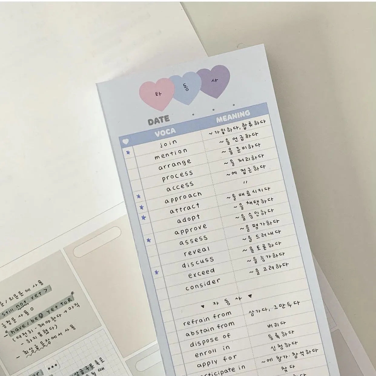 Vertical format English learning notepad with B5 half-size pages in choice of pink, purple or blue covers